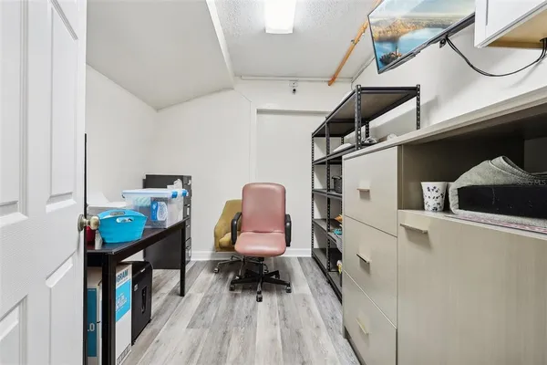 a room with furniture and wooden floor