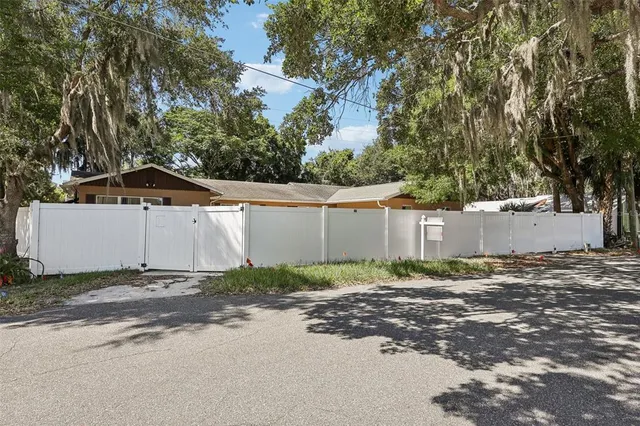 a backyard of a white house