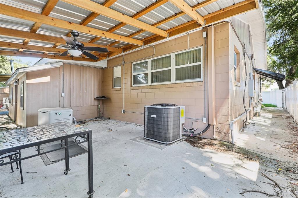 201 Rosefield Avenue Leesburg, FL 34748 - Photo 41 of 43 a view of a patio with table and chairs and barbeque