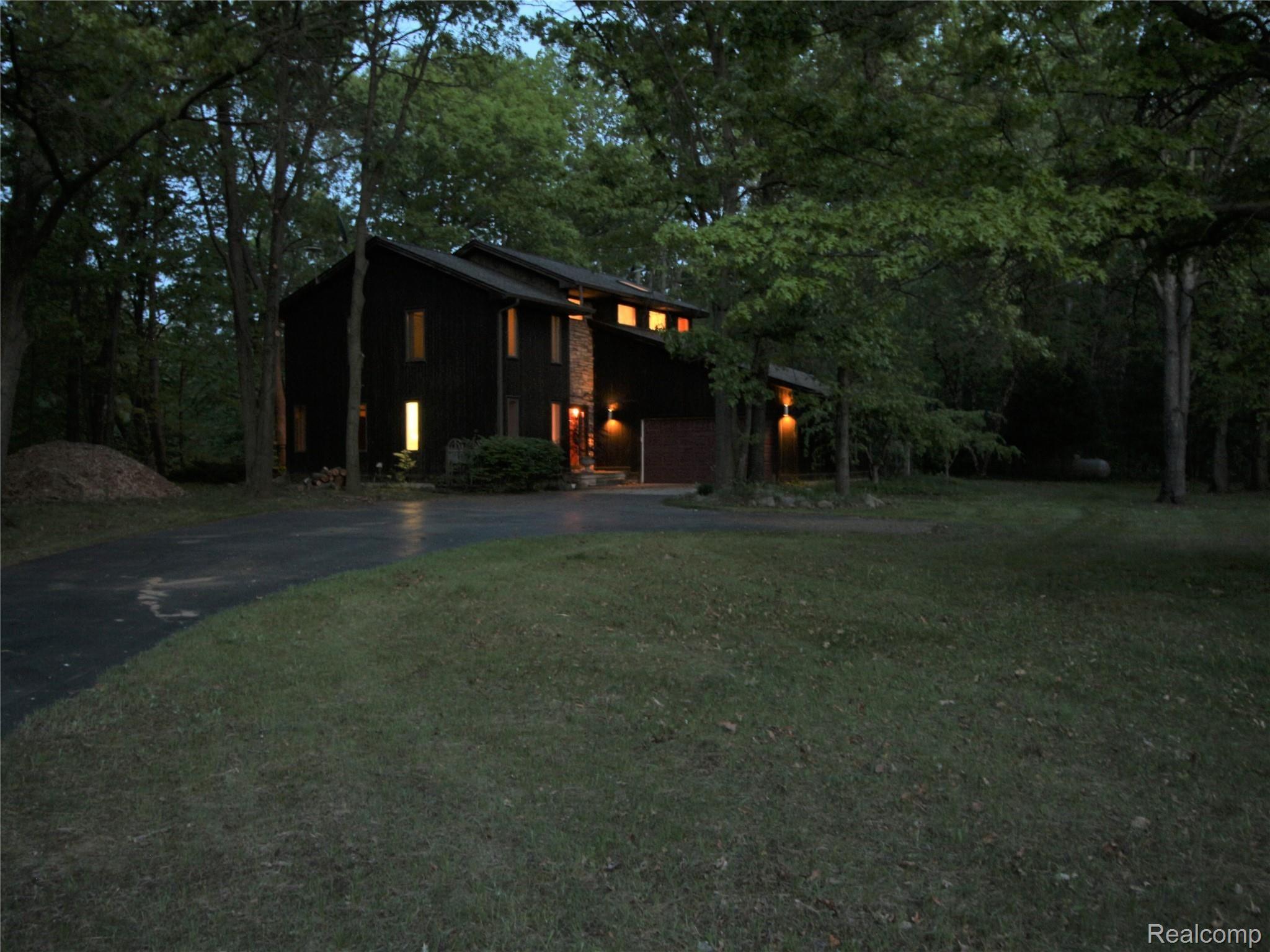 3145 Levalley Road Columbiaville, MI 48421 - Photo 15 of 79 Side from drive at night.JPG