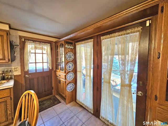 a view of entryway with wooden floor