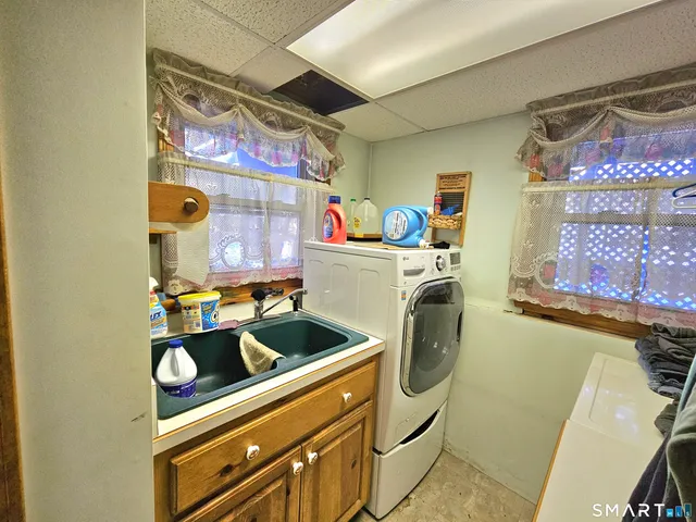 a kitchen with a stove and a sink