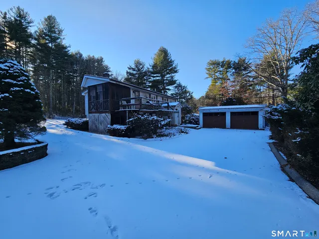 a car parked in front of a house