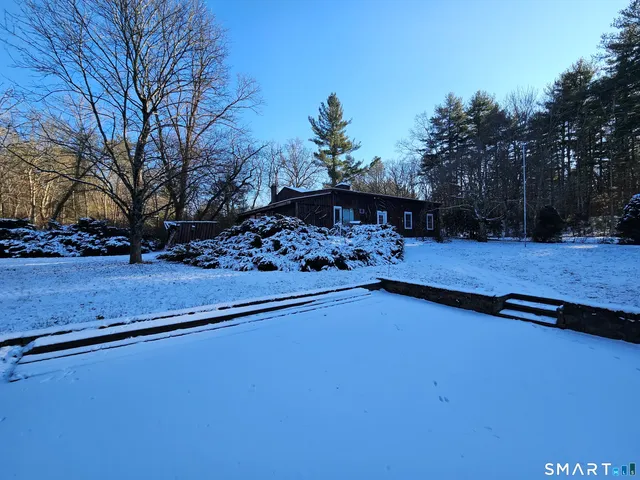 a view of a yard with an outdoor space