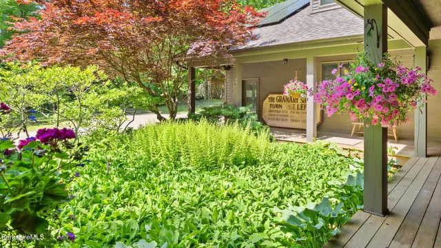 front view of a house with a small yard