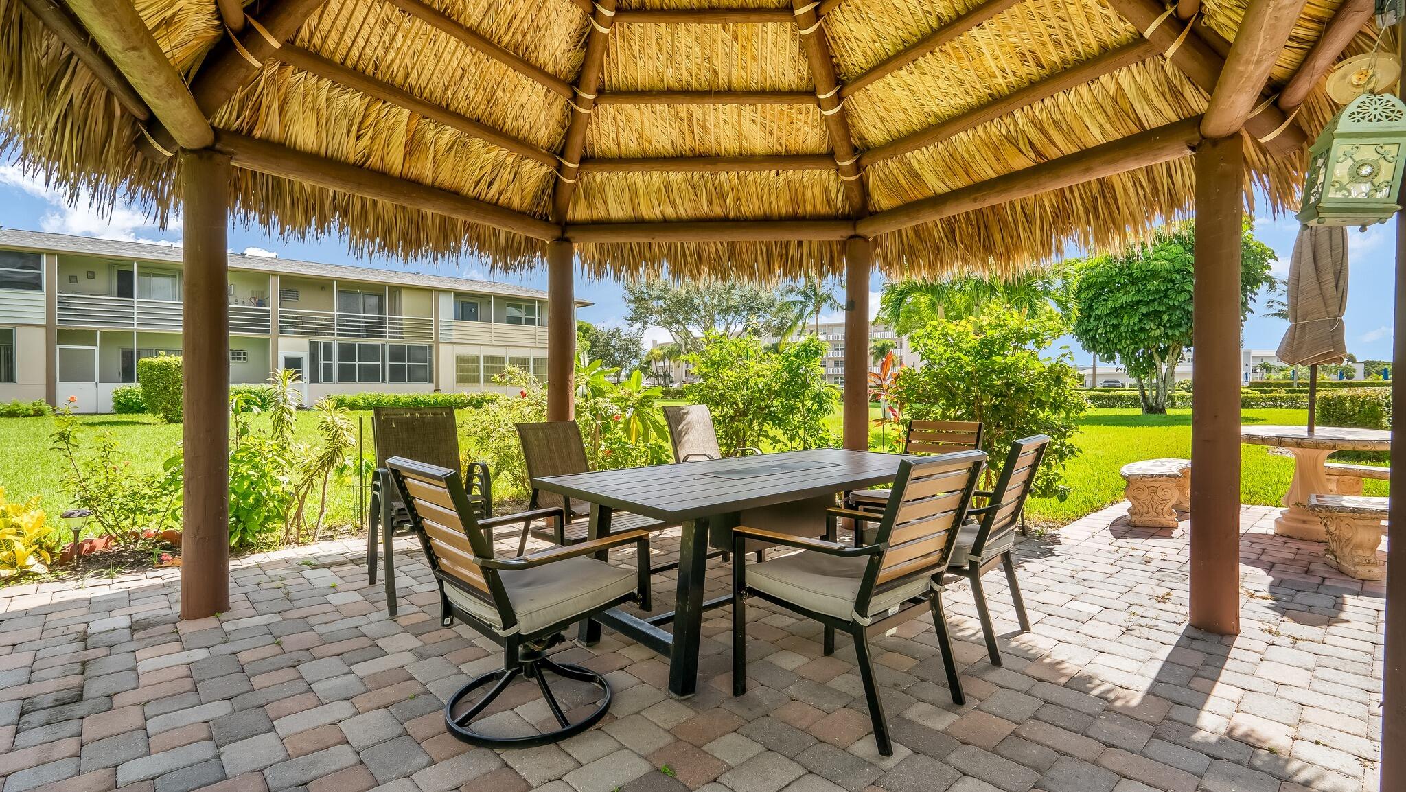 239 Windsor K West Palm Beach, FL 33417 - Photo 11 of 11 a view of an outdoor sitting area