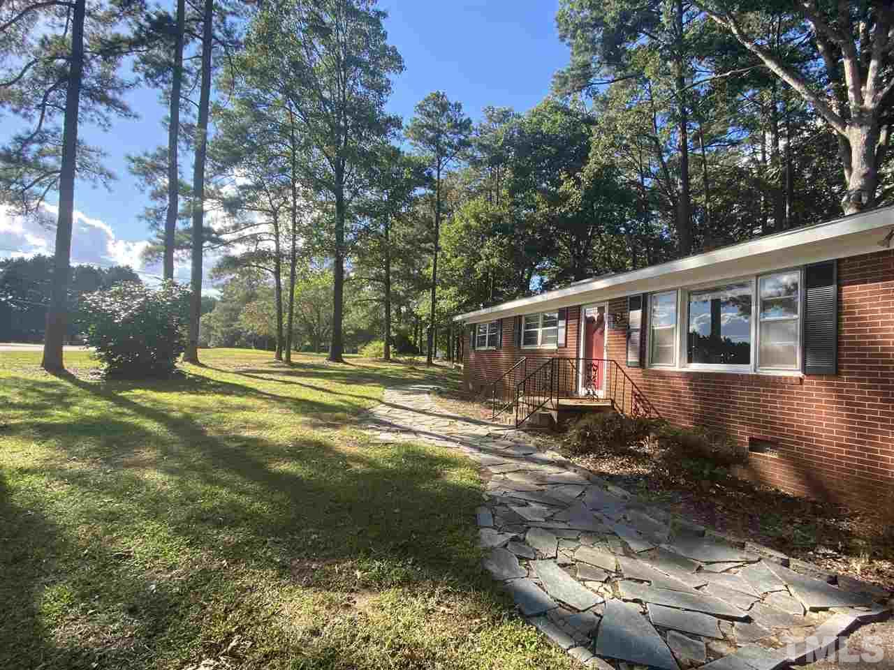 0 Yates Mill Pond Road Raleigh, NC 27606 - Photo 27 of 29 adjacent lot is included in asking price and has detached home, workshop and 2 storage sheds