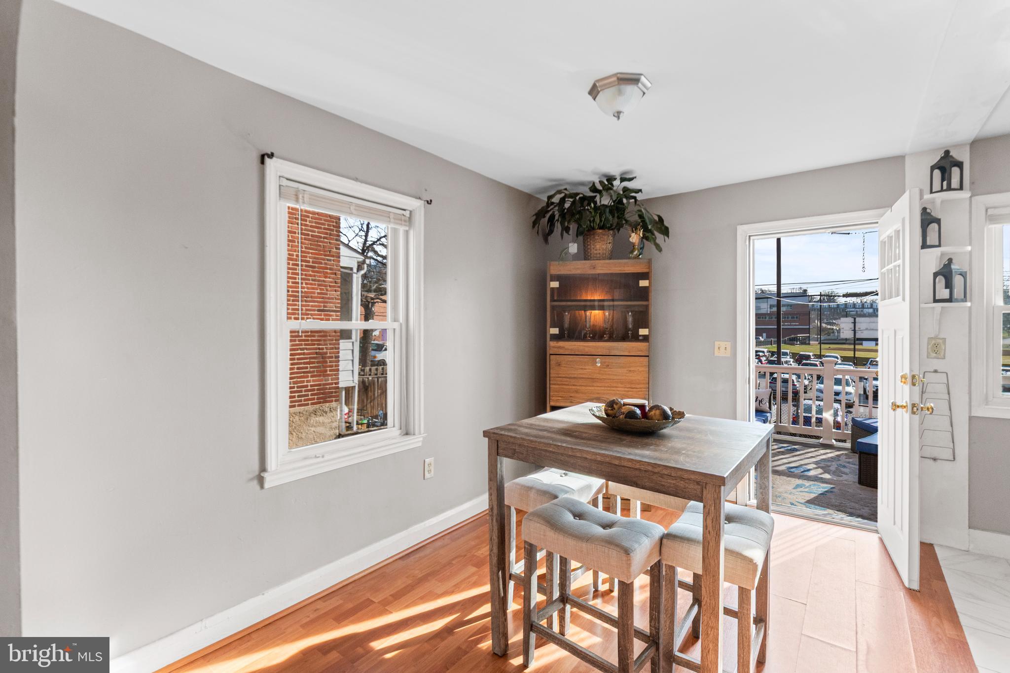 377 Marydell Road Baltimore, MD 21229 - Photo 9 of 35 Dinning Area w/ample lighting and Deck Entrance