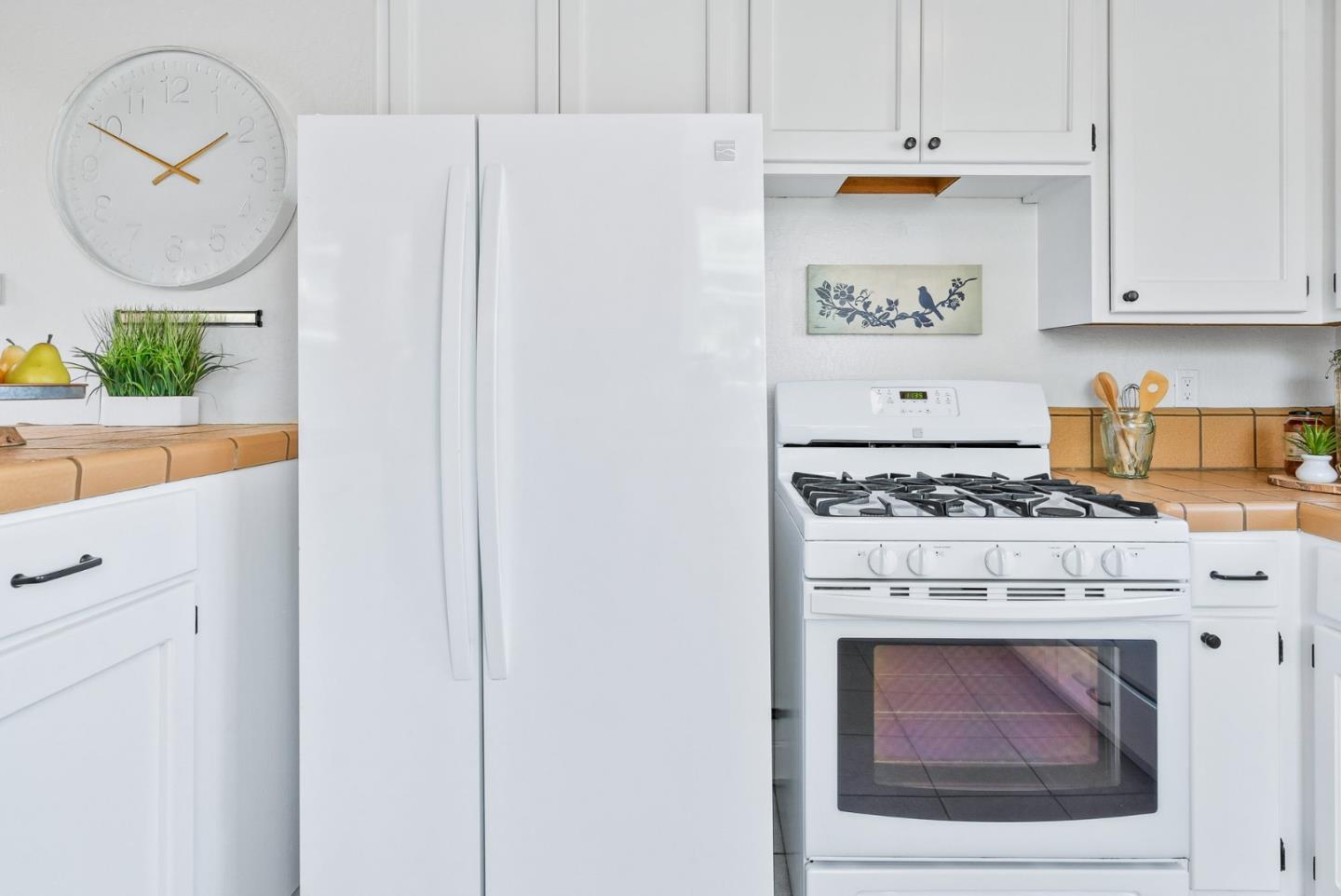 620 Sumner Street Santa Cruz, CA 95062 - Photo 13 of 45 a stove top oven sitting inside of a kitchen