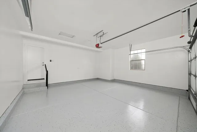 a balcony with wooden floor and fence