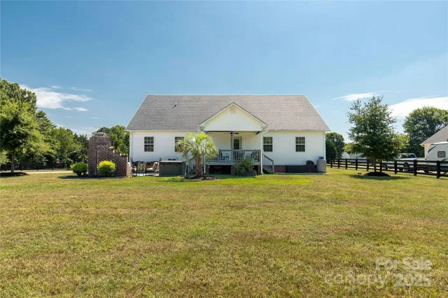 a view of a balcony with furniture