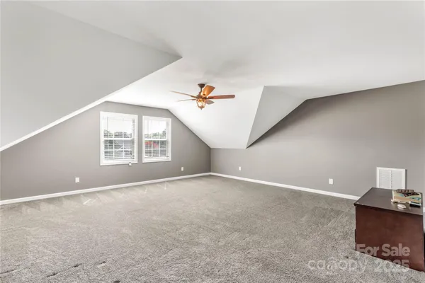 a view of a livingroom with a flat screen tv