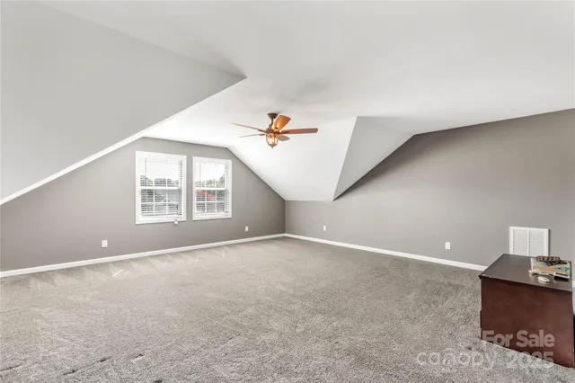a view of a livingroom with a flat screen tv