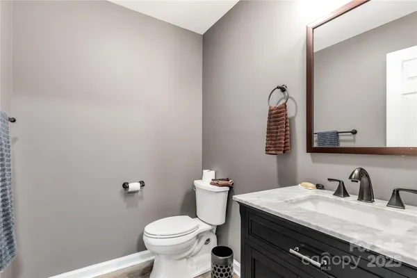 a view of a swimming pool with a lake view