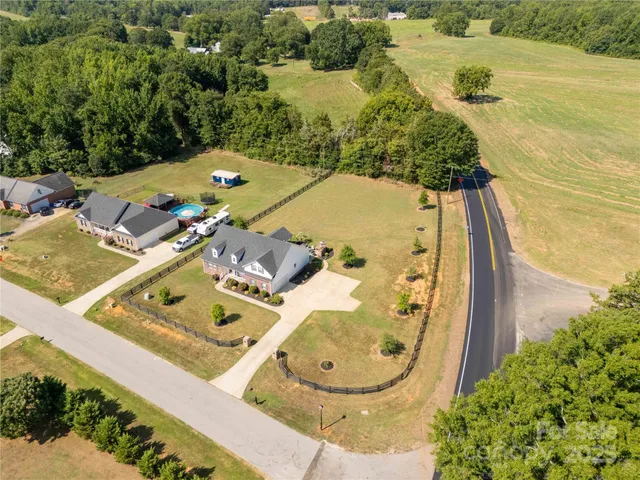 an aerial view of a swimming pool