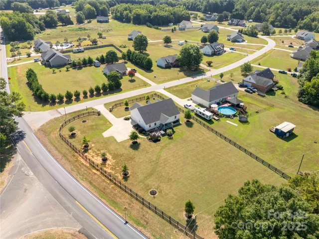 a view of swimming pool from a balcony