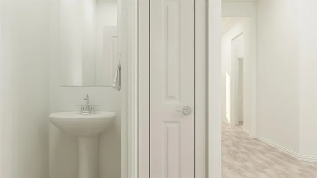 a bathroom with a sink a mirror and a shower