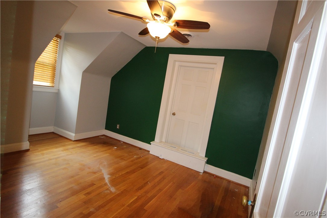 11268 Hanover Courthouse Road Hanover, VA 23069 - Photo 16 of 21 a view of an empty room with wooden floor and a window