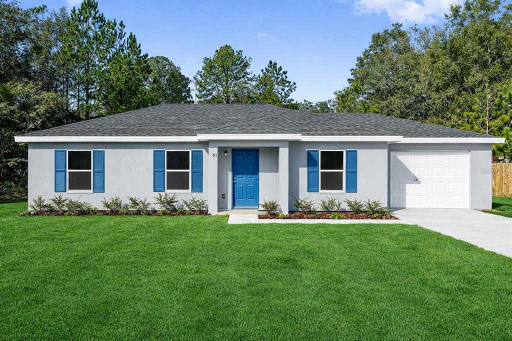6 Locust Course Radiel Ocala, FL 34472 - Photo 1 of 1 front view of a house that has a yard
