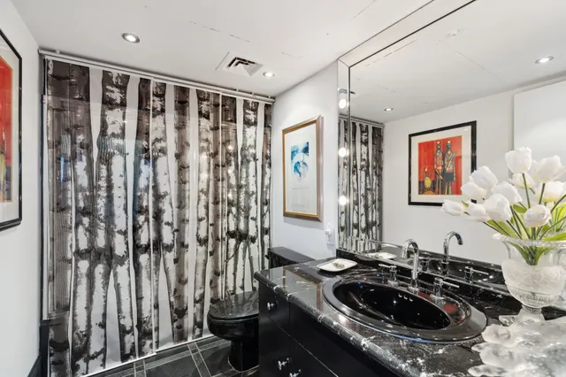 a bathroom with a sink and a bathtub