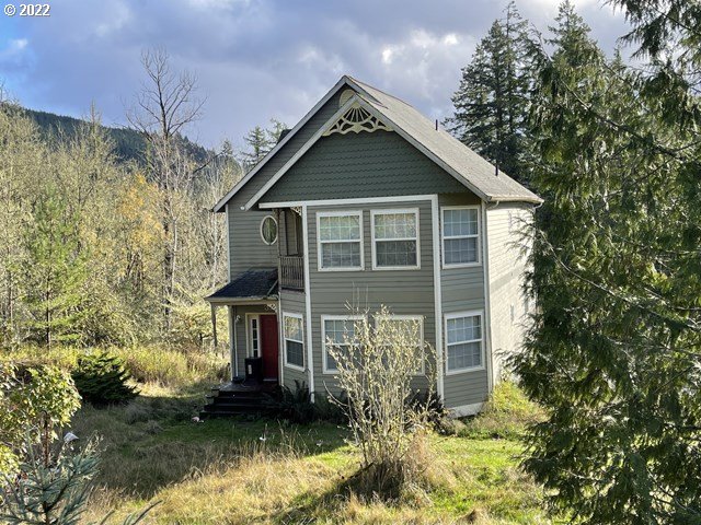 326 P G Sweet Road Kelso, WA 98626 - Photo 1 of 15 a front view of a house with a yard