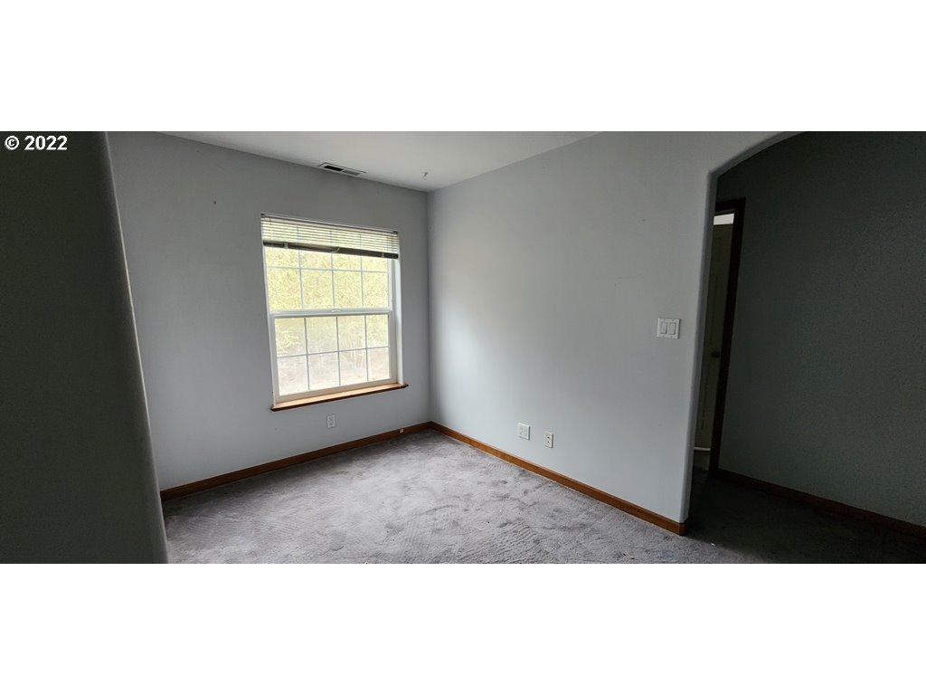 326 P G Sweet Road Kelso, WA 98626 - Photo 9 of 15 a view of an empty room with a window
