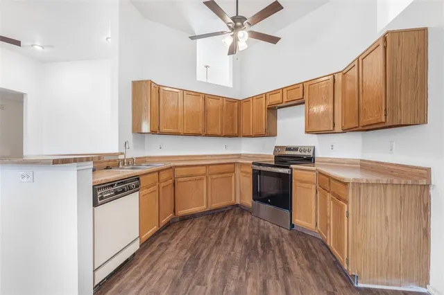 a kitchen with a stove and a sink