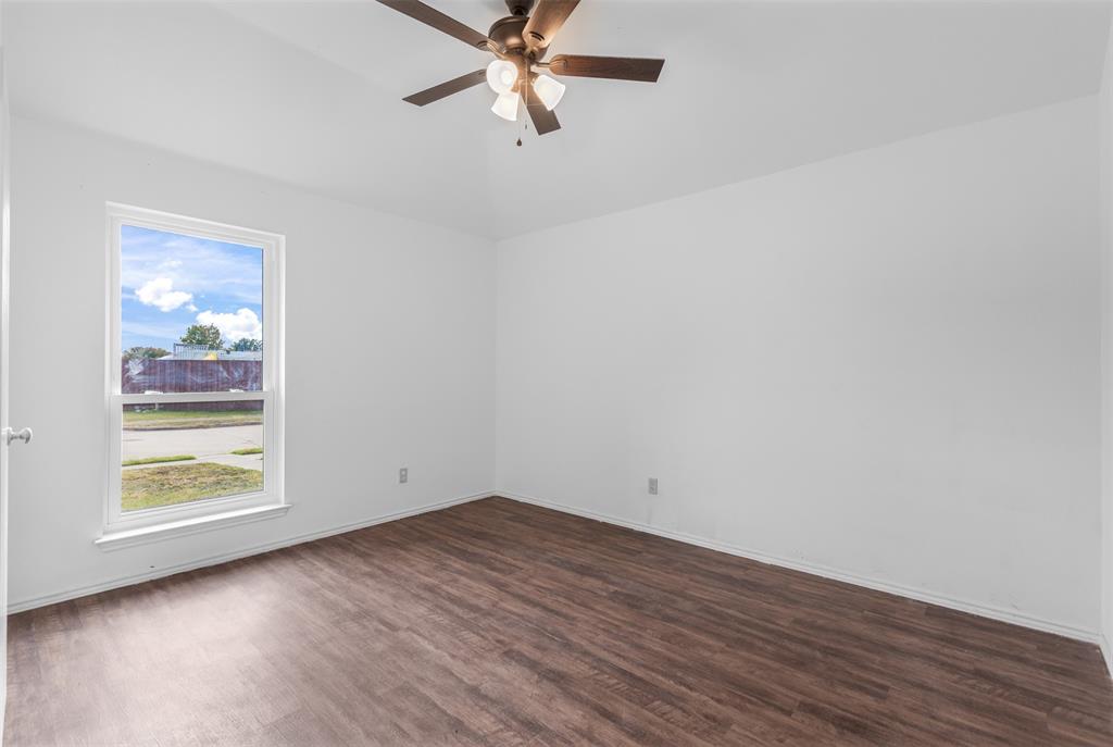 1313 Clover Drive Allen, TX 75002 - Photo 19 of 30 wooden floor in an empty room