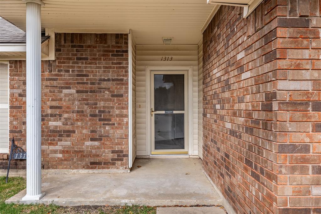 1313 Clover Drive Allen, TX 75002 - Photo 3 of 30 a view of front door of house and an entrance