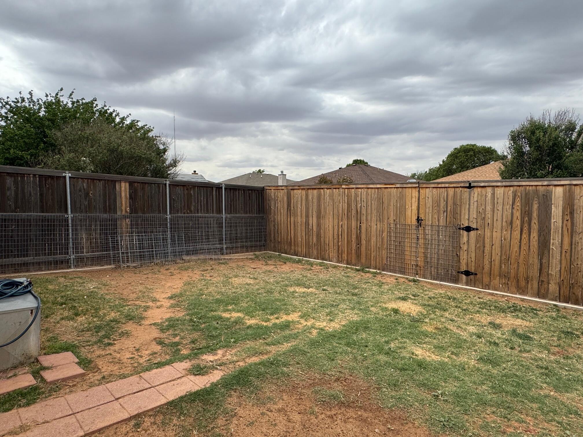 1906 81st Street Lubbock, TX 79423 - Photo 14 of 14 a view of a backyard