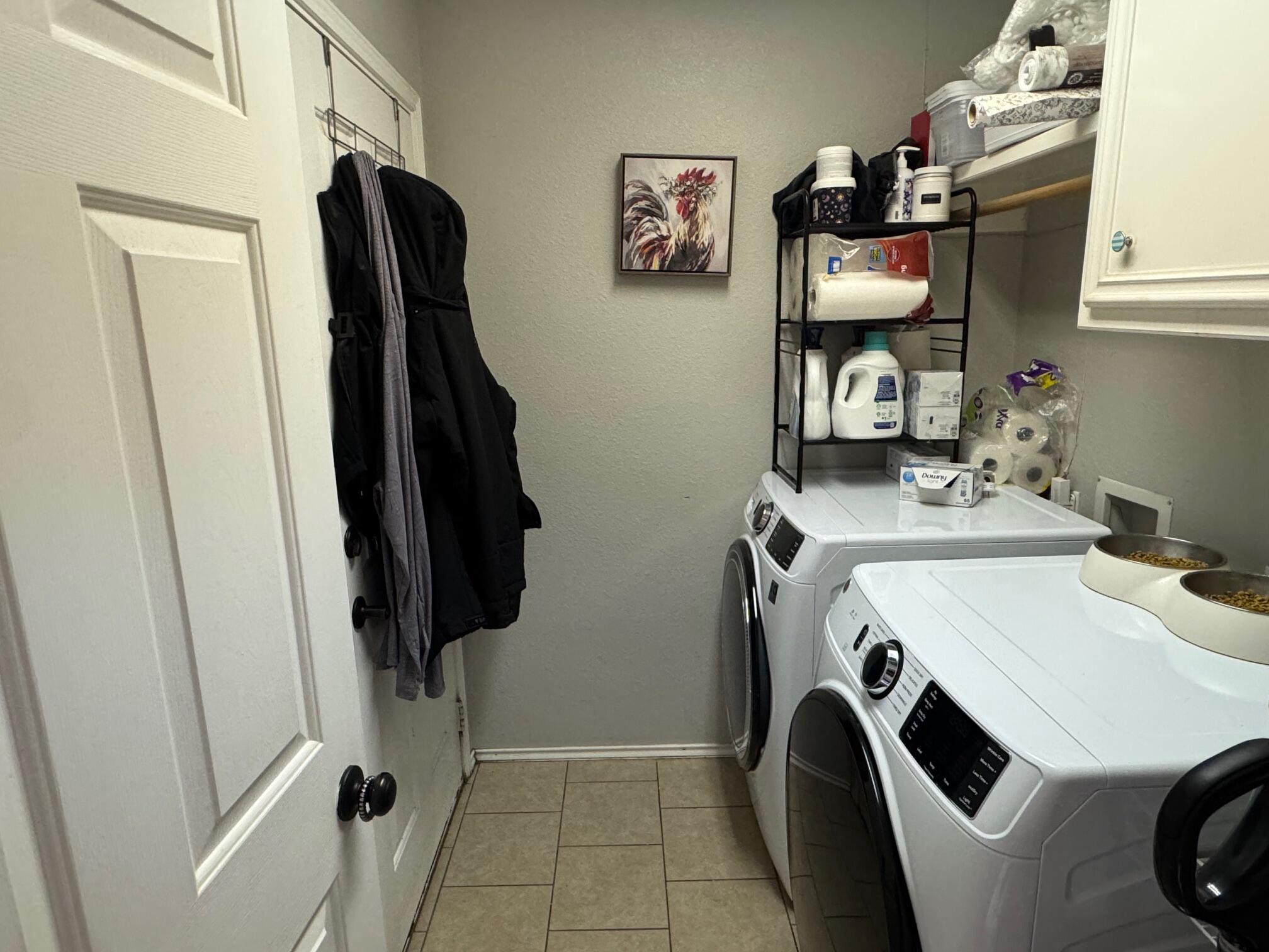 1906 81st Street Lubbock, TX 79423 - Photo 9 of 14 a utility room with dryer and washer