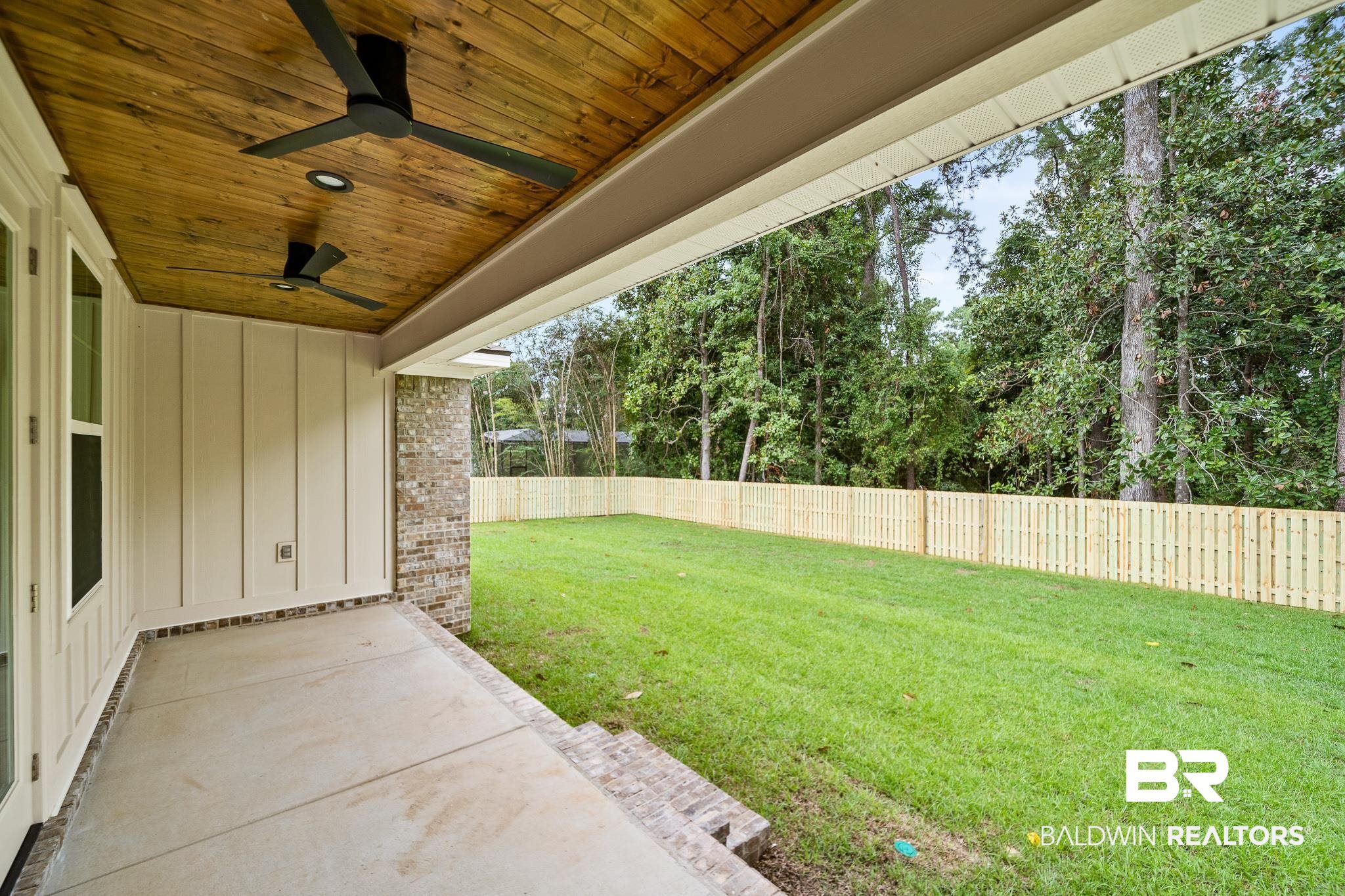 29 Signal Hill Road Daphne, AL 36527 - Photo 29 of 36 View of yard with ceiling fan and a patio area