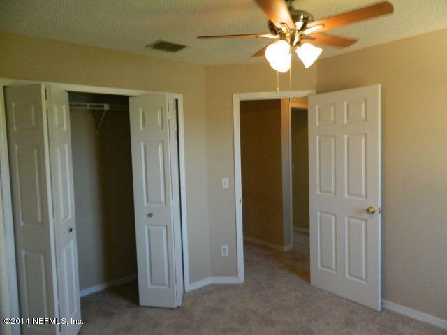 1649 Derringer Road Jacksonville, FL 32225 - Photo 44 of 50 wooden floor in an empty room