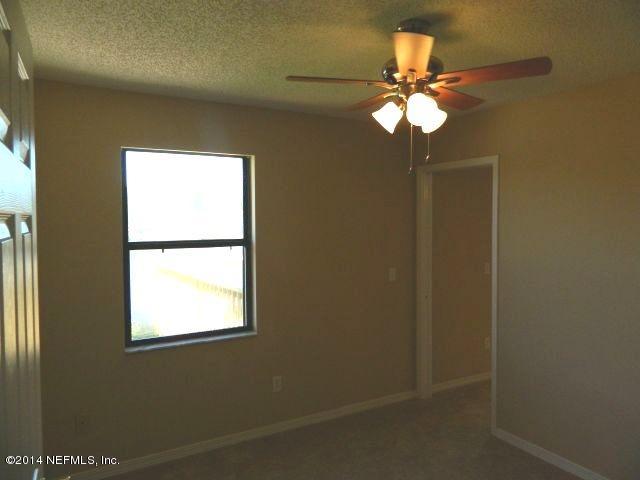 1649 Derringer Road Jacksonville, FL 32225 - Photo 45 of 50 a view of a window in a room
