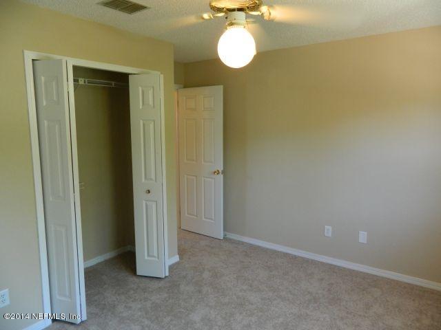 1649 Derringer Road Jacksonville, FL 32225 - Photo 47 of 50 a view of a room with a mirror