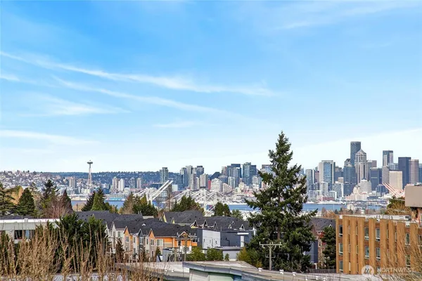 a view of a city with tall buildings