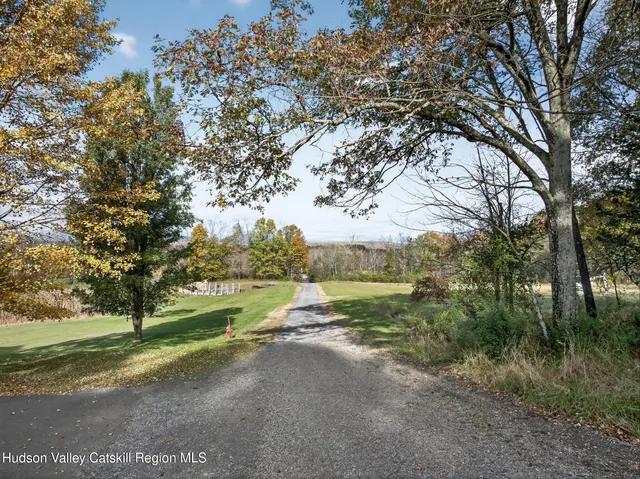 a view of a road with an trees