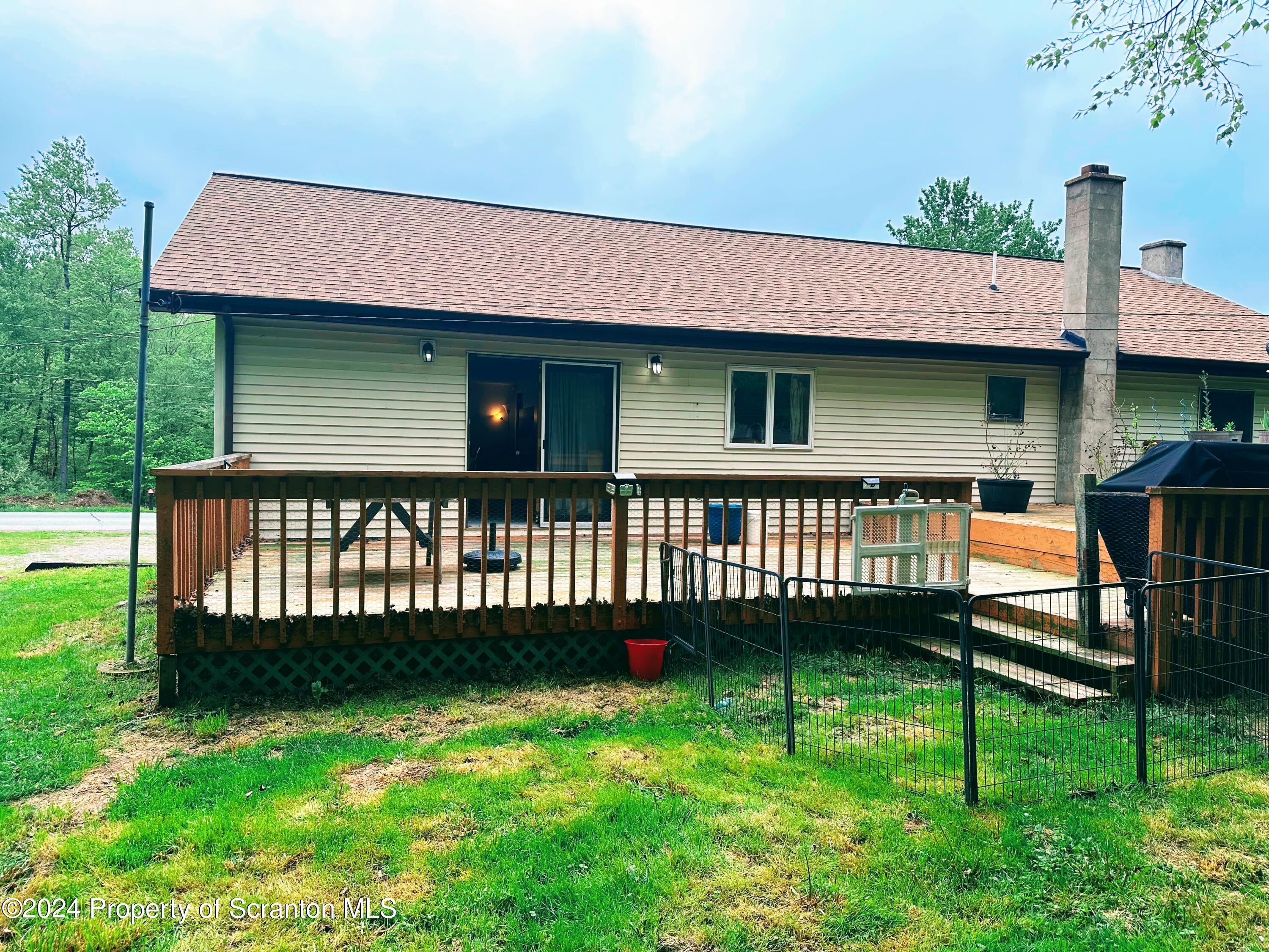 950 Tannery Road Lake Ariel, PA 18436 - Photo 6 of 29 a front view of a house with a yard