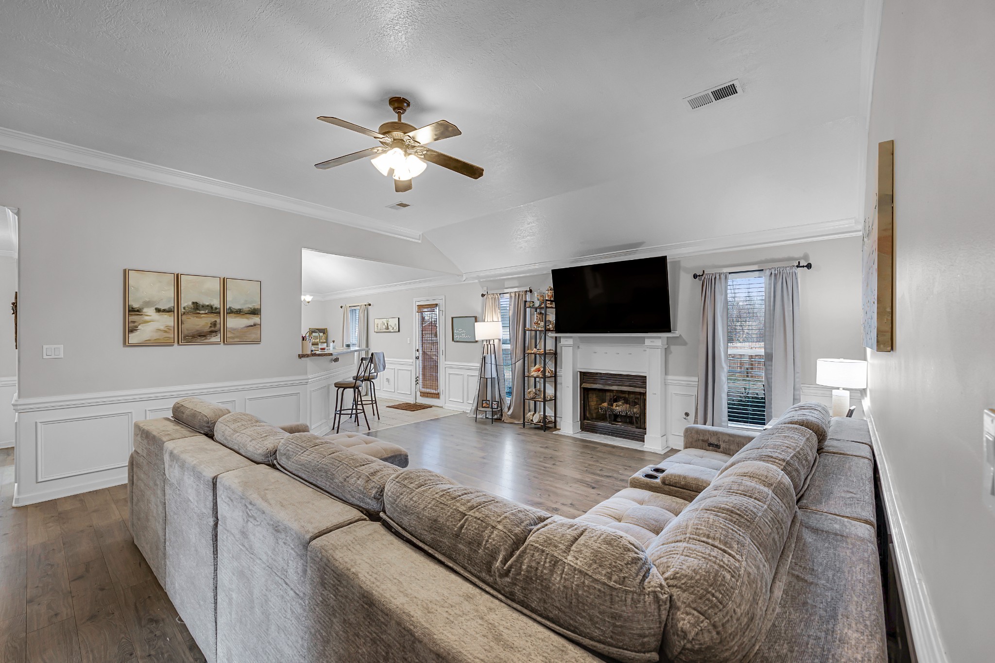 23 Matrix Cove Jackson, TN 38305 - Photo 5 of 16 a living room with fireplace furniture and a flat screen tv