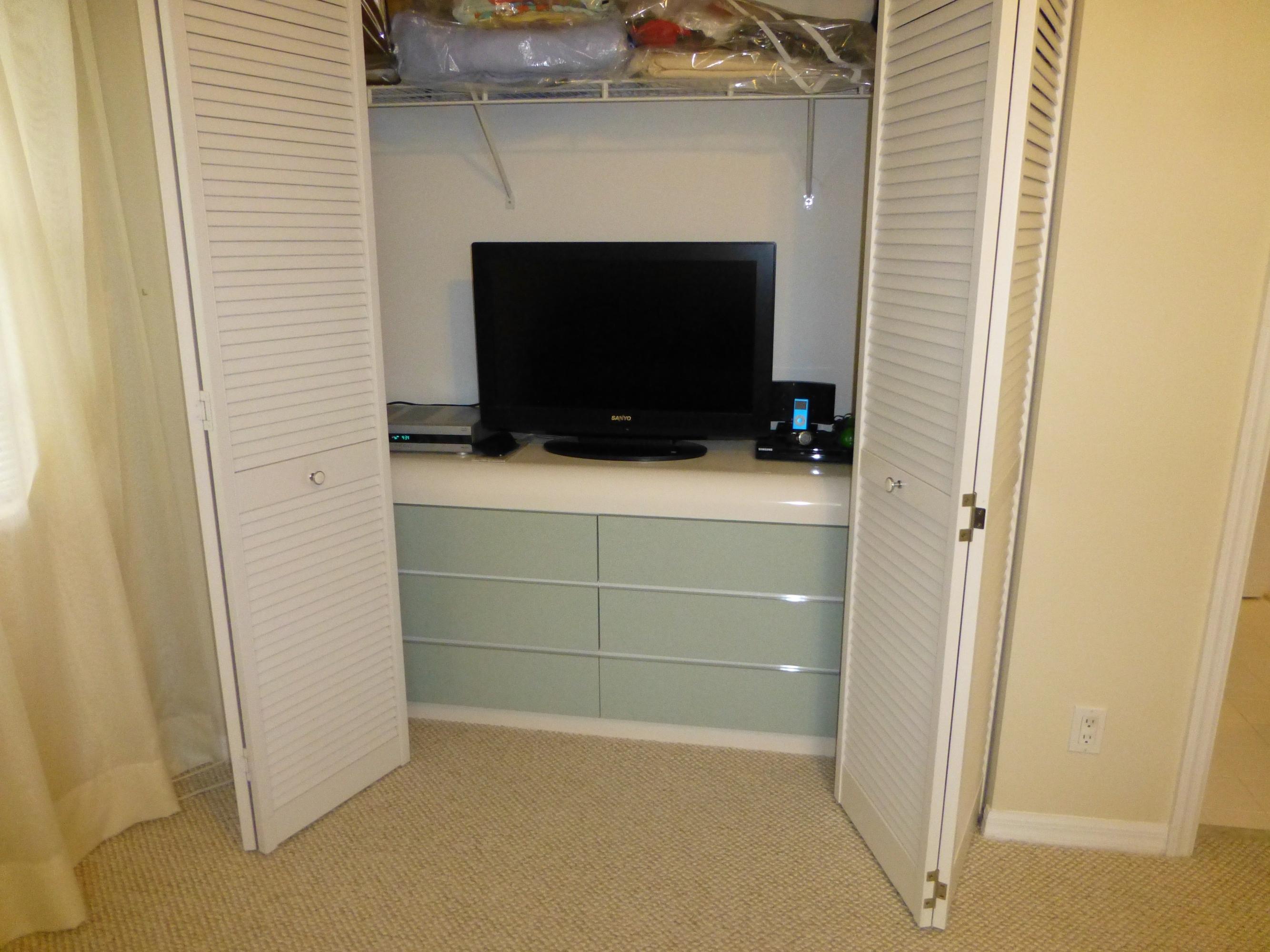 5733 Aspen Ridge Court Delray Beach, FL 33484 - Photo 24 of 38 CLOSET WITH TV