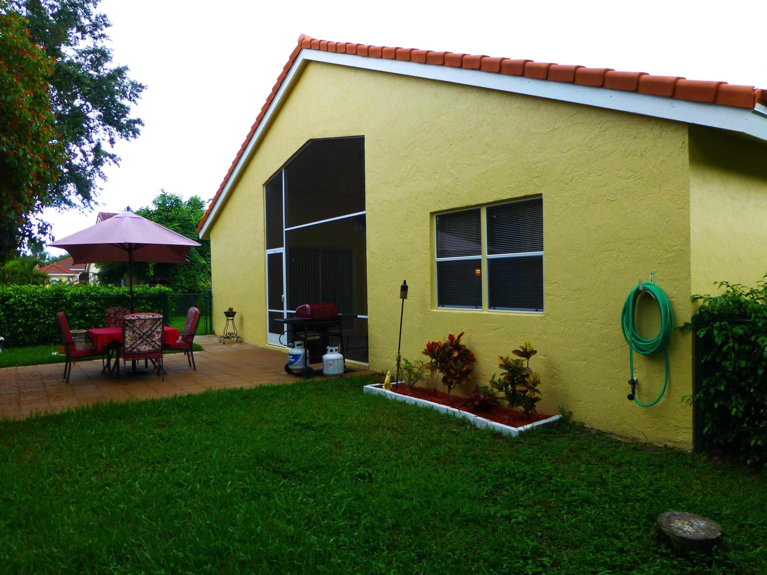 5733 Aspen Ridge Court Delray Beach, FL 33484 - Photo 32 of 38 EXTERIOR BACK
