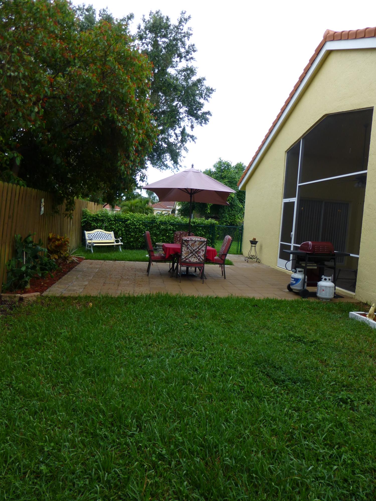 5733 Aspen Ridge Court Delray Beach, FL 33484 - Photo 33 of 38 EXTERIOR BACK