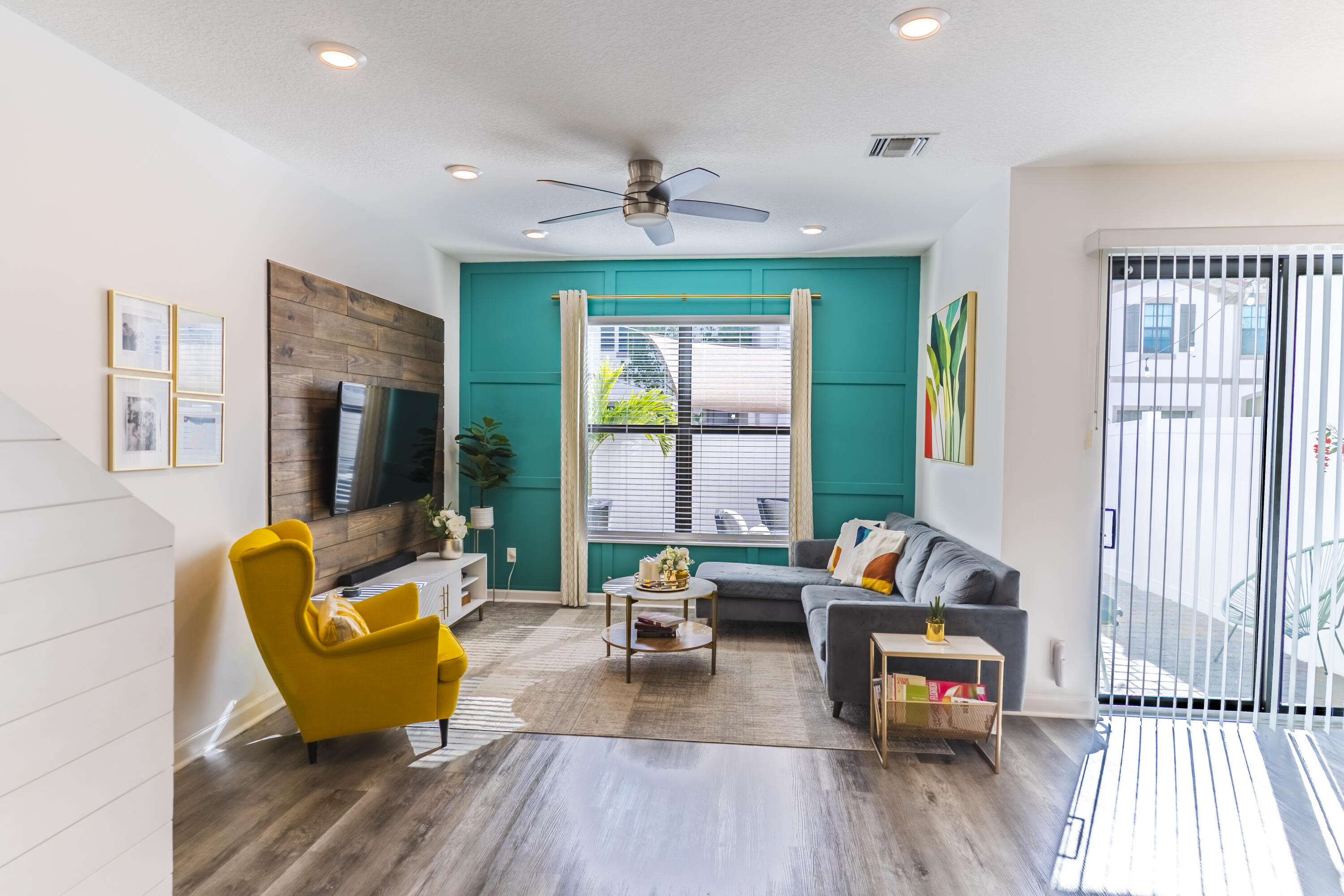 2025 Sugar Maple Drive Riviera Beach, FL 33410 - Photo 5 of 23 a living room with furniture and a large window