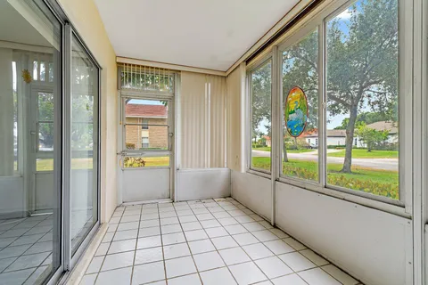 a view of an entryway with a garden