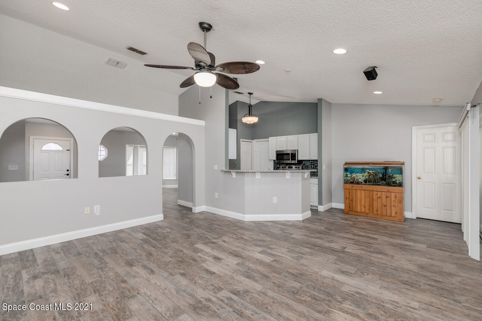 335 Gordon Road Northwest Palm Bay, FL 32907 - Photo 12 of 58 a view of a kitchen with a sink and a window