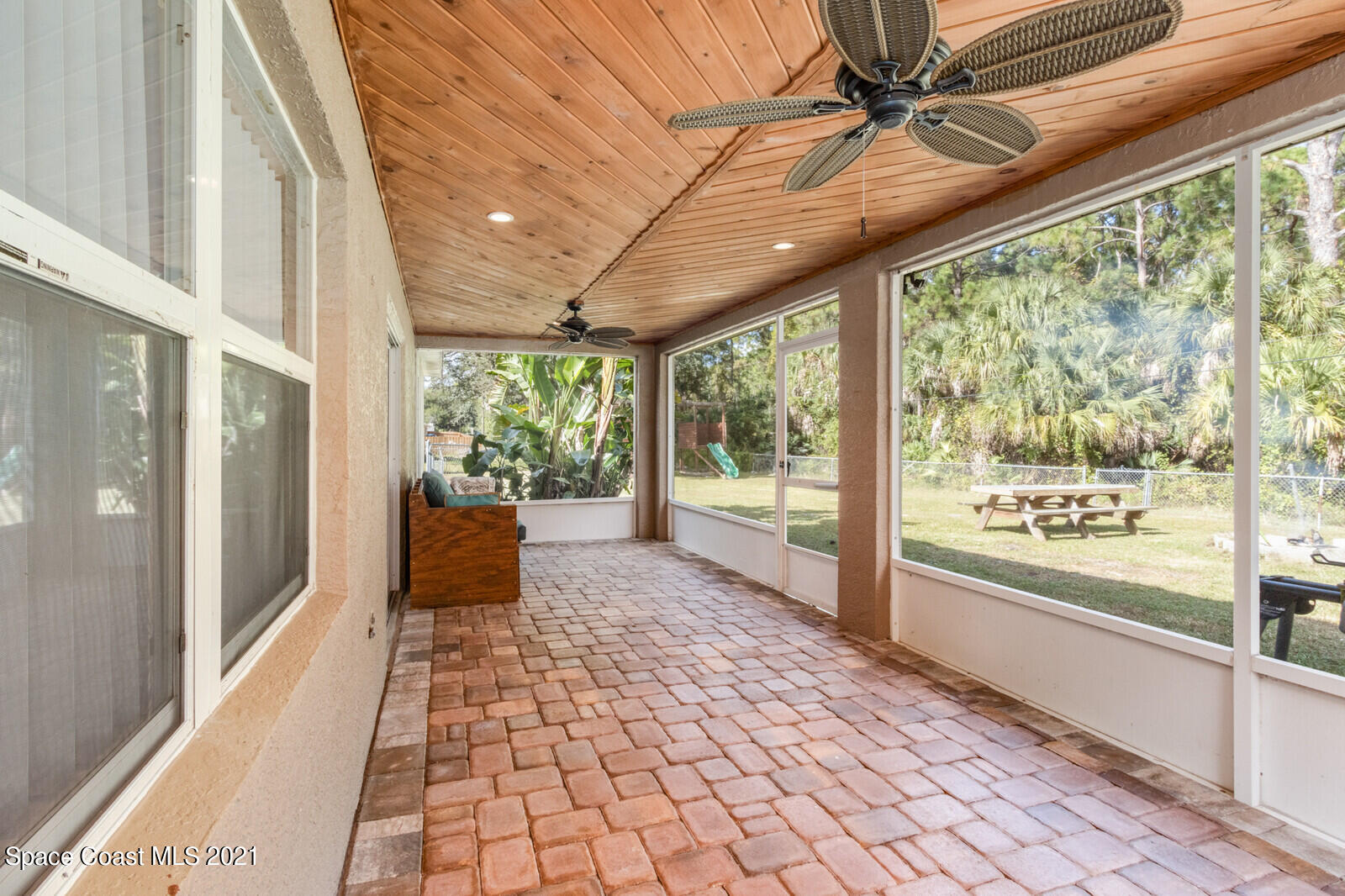 335 Gordon Road Northwest Palm Bay, FL 32907 - Photo 35 of 58 a large room with a large window and front door