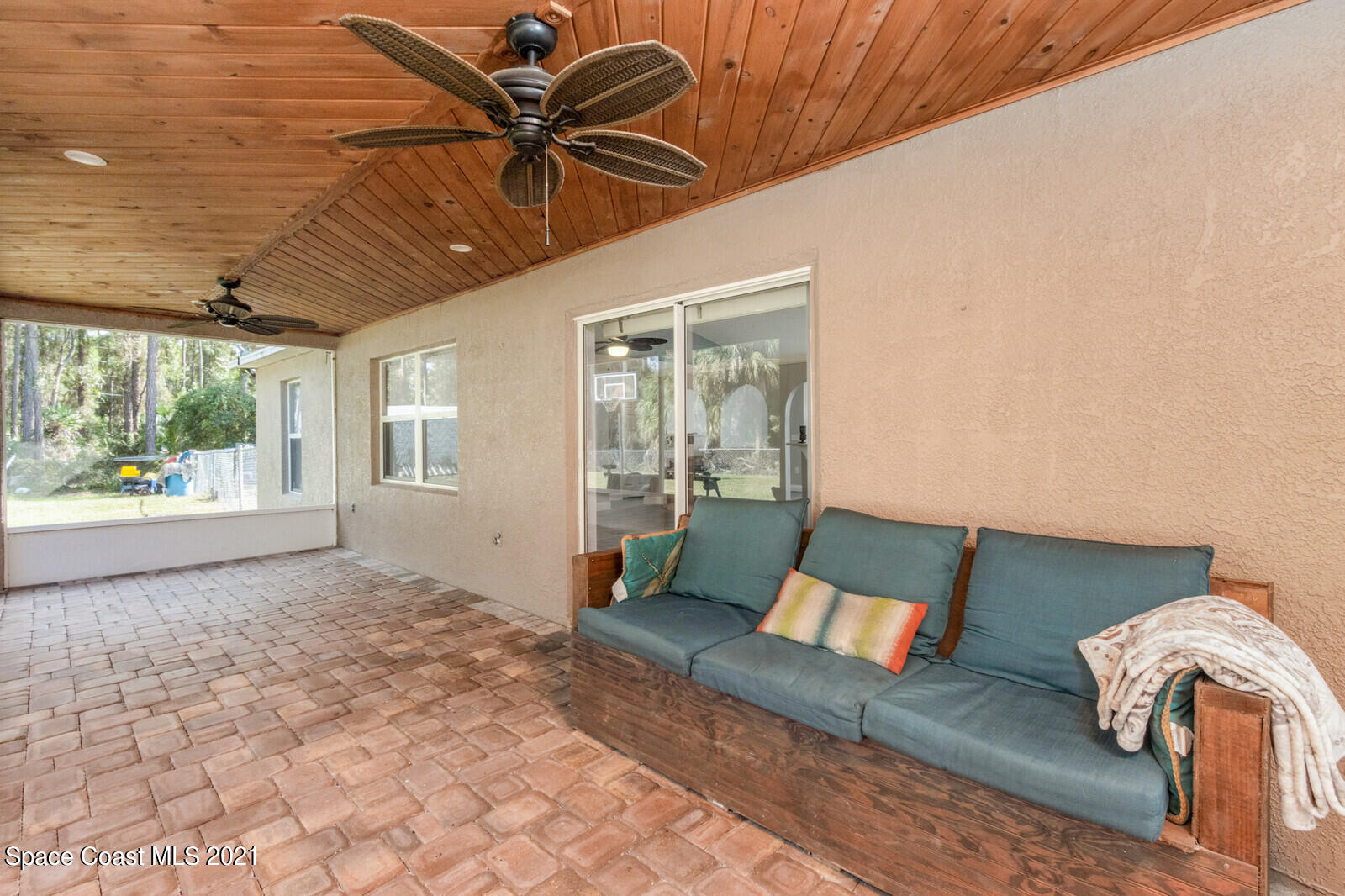 335 Gordon Road Northwest Palm Bay, FL 32907 - Photo 36 of 58 back screened porch area