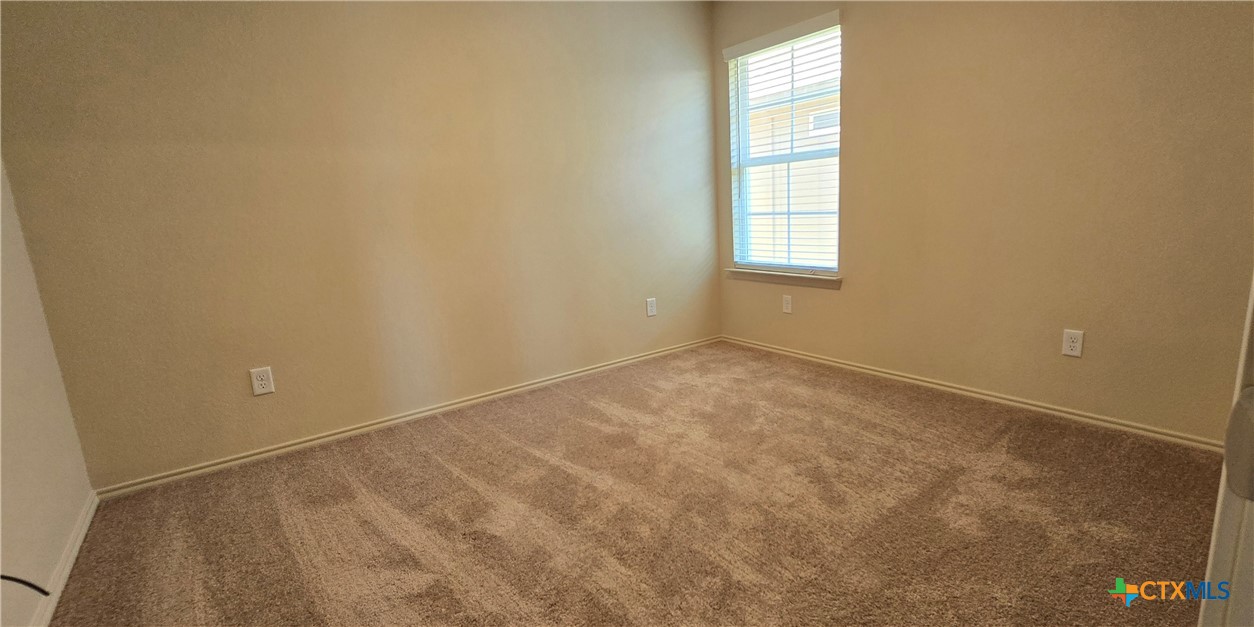 338 Monty Road Copperas Cove, TX 76522 - Photo 7 of 14 an empty room with windows