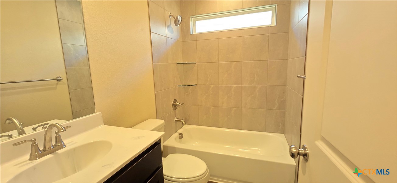 338 Monty Road Copperas Cove, TX 76522 - Photo 9 of 14 a bathroom with a sink and a bathtub