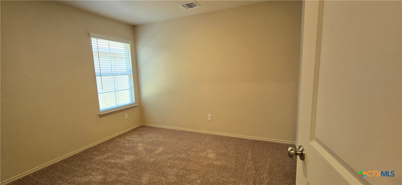 338 Monty Road Copperas Cove, TX 76522 - Photo 10 of 14 an empty room with windows